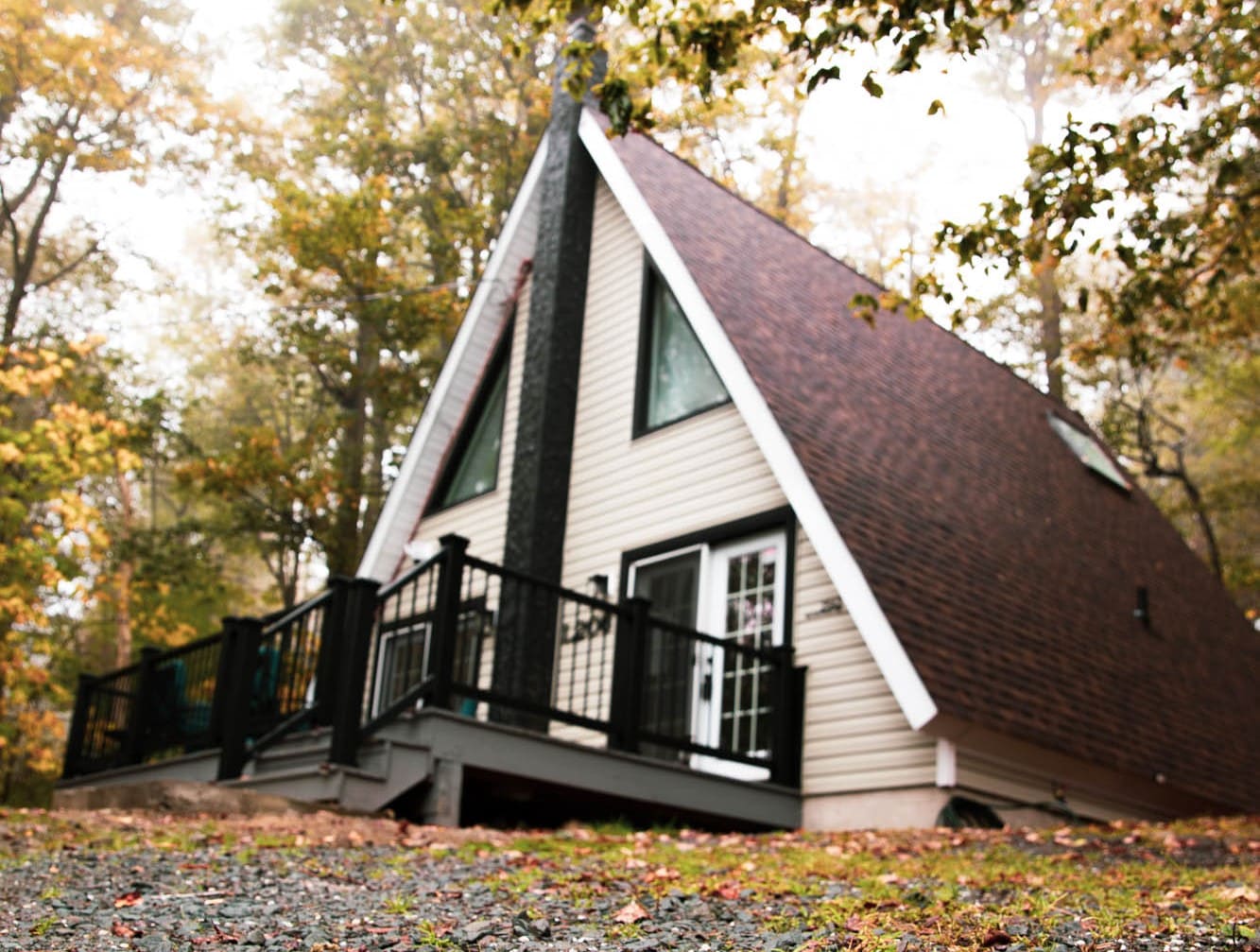 Poconos A-Frame cabin nestled among the trees in the Pocono Mountains
